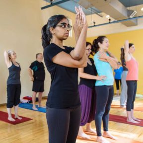 yoga class with eagle pose