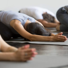forward bend in yoga class