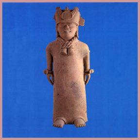 Standing clay figure